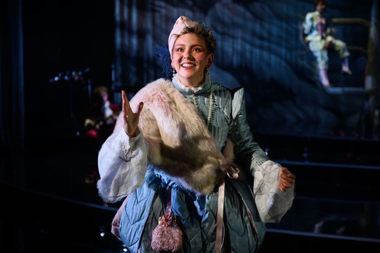 Scene from Orlando - actor smiling in 16th-century period clothing